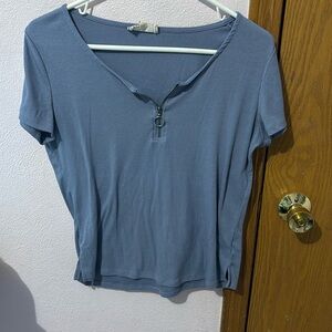 Cute half vip up blue top.